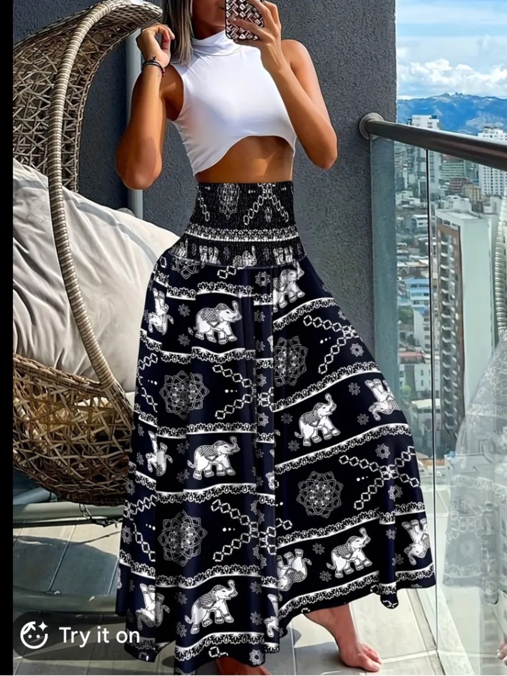 Navy blue Boho-style pants w white elephant & mandala print w smocked waistband.
